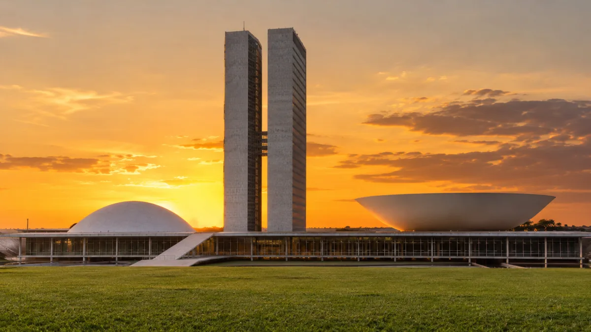 Edifício do Congresso Nacional com as duas torres e as cúpulas ao entardecer. Ilustração gerada por inteligência artificial.